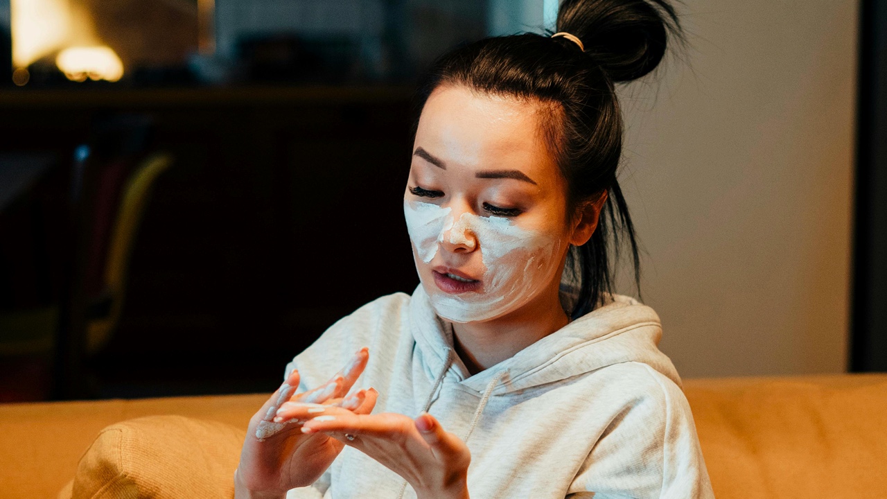 Woman using skincare